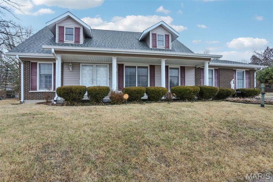 Located on a cul-de-sac in Florissant, this 5-bedroom, 2 full bath home offers multiple living areas and a partially finished basement with bar and media space. Built in 1969, the layout includes 2 bedrooms on the main level and 3 bedrooms upstairs, providing flexible use across levels. The main level features hardwood flooring in the living room, formal sitting room, formal dining room, primary bedroom, kitchen, and breakfast nook. The formal dining room is connected to but separate from the kitchen, while the breakfast nook opens directly to the living room, creating flow between everyday living spaces. The kitchen includes granite countertops and cooktop with double ovens. Upstairs bedrooms feature luxury vinyl plank flooring. The partially finished lower level includes carpeted media and recreation space with bar area, standard ceiling height, and additional unfinished storage. The unfinished portion of the basement includes a dedicated laundry area. No egress window in the lower level. Exterior features include a fenced backyard, concrete driveway, attached 2-car garage, and covered front porch. Lot size approximately 0.26 acres. Convenient Florissant location with proximity to retail, grocery, and park amenities. Includes 3D walkthrough, video tour, and interactive floor plan viewer for full layout reference.

Aldi ~1.4 mi Made by Lia ~2.8 mi Old Town Florissant District ~2.9 mi St Ferdinand Park ~2.9 mi Sunset Park ~6.3 mi Easy Access to 67 and 270