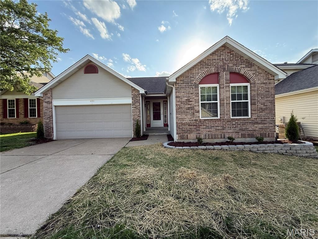 Photo of 409 Hunters Crossing Court, Wildwood, MO 63040 (MLS # 26027504)