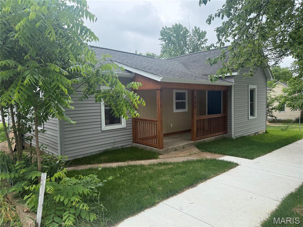 Photo of 709 N 2nd Street, De Soto, MO 63020 (MLS # 26032661)