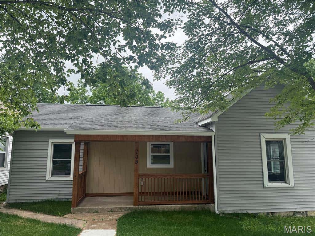 Photo of 709 N 2nd Street, De Soto, MO 63020 (MLS # 26032661)