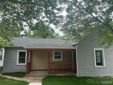 Photo of 709 N 2nd Street, De Soto, MO 63020 (MLS # 26032661)