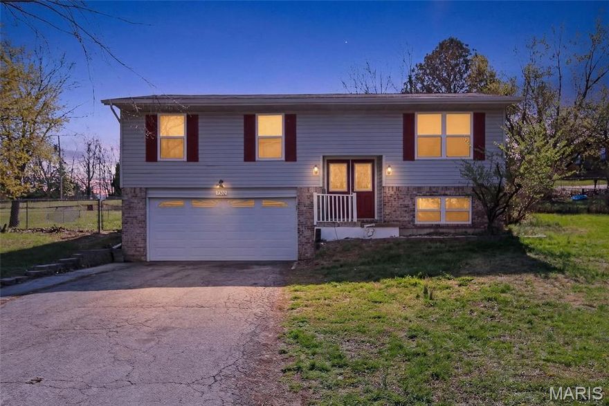 Dreaming of extra space, peace, and room to play? Welcome to 7302 Carriwood DR, Cedar Hill, MO 63016! 
This move-in ready 4 bed, 3 bath gem sits on a sprawling 1/2 acre fenced lot—perfect for backyard barbecues, kids & pets, or your very own garden oasis! Enjoy a bright Great Room, spacious kitchen with pantry & newer ceramic flooring, and a cozy 3-season sunroom for all-year relaxation. The master suite offers a private bath, while the lower level flexes as an extra bedroom or family hangout with full bath & walk-in closet! Oversized garage + workshop = space for hobbies & storage galore. Ready for a fresh start? Schedule your tour today and make this beautiful home yours! Selling the house As-Is, seller to make no repairs but is offering a 1-year Choice Plus Home Warranty.