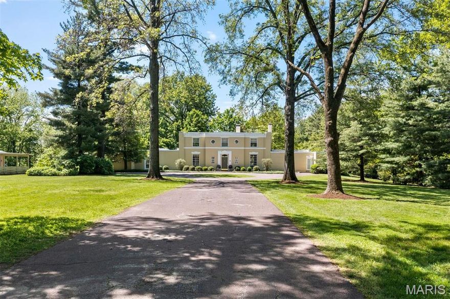 Offered for the first time in over 3 decades, this classic 1937 estate designed by Nagel & Dunn offers an exceptional opportunity to own a piece of architectural history. Set on nearly 3.4 acres of beautifully landscaped grounds, this serene property spans 2 contiguous, buildable lots, offering flexibility and investment potential. The current owners have not only maintained and updated the home, but have reimagined how the space can be used. The East Wing of the main level features a contemporary style Kitchen and Hearth Room for casual gatherings, while the West Wing’s Family Room includes a full Bathroom with direct patio and pool access, perfect for use as a pool cabana. Upstairs highlights include a convenient laundry room with a stacked washer/dryer plus an updated Primary Ensuite with a soaker tub, oversized glass shower and radiant heat flooring.  In 2021, a photovoltaic solar panel system was installed which supplies more than 20% of the electricity consumed.