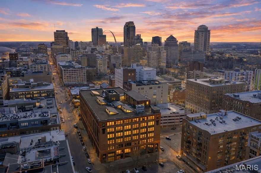 The epitome of loft living! 1520 Washington Avenue in a historic building offers 2 bedrooms, 2 full baths, and a perfect home office space. This building is in a great location close to the soccer park, the hockey arena, great cuisine, and night light, and a short stroll to Busch Stadium. With soaring ceilings, a superb layout, and an abundance of natural light through the massive windows, this loft is a slice of paradise within a bustling vibrant city life. You will appreciate how all of the elements come together on this one with the original hardwood floors, exposed duct work, exposed brick, updated kitchen, updated light fixtures, and added elegant detailed touches throughout that you have to see for yourself! The building also offers a spacious rooftop offering one of the best views in all of St. Louis with the City Museum to your left and looking back on The Arch for a fantastic point of view. Also on the rooftop is a community room and a large gym. For ultra convenience, pull into the secure underground parking garage and into your reserved spot in close proximity to the elevator and take that to the 5th floor, and the loft door is right around the corner. This loft has it all, schedule your showing today!
