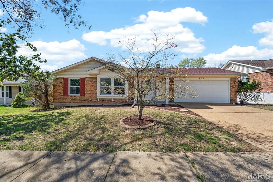 This spacious 4-bedroom, 2-bath ranch offers comfort, style, and room to grow. The open floor plan is filled with abundant natural light, creating a warm and inviting atmosphere throughout. Hardwood floors span the main living areas, while a charming brick fireplace serves as the living room's focal point, complete with sliding doors that lead to the backyard patio. A separate dining room flows seamlessly into the kitchen, making it ideal for entertaining. The kitchen is well-appointed with granite countertops, stainless steel appliances, a classic subway tile backsplash, and ample cabinetry with open shelving to meet all your culinary needs. The primary suite features a walk-in closet, an additional closet, and a private en-suite bath. A second bedroom also includes a walk-in closet, along with two additional bedrooms on the main level, offering plenty of space for family, guests, or a home office and an additional full bath. The expansive lower level provides endless potential for additional living space, along with a dedicated laundry area and plenty of storage. Step outside to enjoy the fenced backyard with a patio perfect for summer barbecues, plus generous green space for gardening, play, or relaxing outdoors.