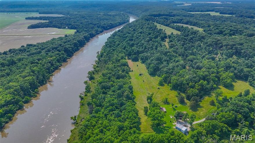 Get ready to have your socks knocked off by this jaw-dropping 54-acre slice of secluded paradise! With rolling hills and stunning bluff views over the Salt River, it's a dream come true for nature lovers and hunters—or anyone who just wants to pretend they're in a nature documentary. The cabin has solid white oak siding on the exterior and more solid white oak plank inside. The updated interior has three bedrooms, one bath, and just over 1,250 square feet on the main level. If you just need more space, the 1200 SF unfinished walkout basement is plumbed for a second bath, laundry room, and more storage. Roam through scenic valleys and wooded trails bursting with wildlife.

With acres of open pasture, food plots, 2 ponds, rolling hills with heavy timber, and blufftop Salt River views, this retreat is sure to make any hunter's heart skip a beat. Recent updates include a newer HVAC system, a new well pump, and septic system because nobody likes surprises when it comes to plumbing. The 24x48 shop has additional storage for all your outdoor toys, wired electric and concrete floors.

Located next to the Hoot Owl Hollow-Salt River boat ramp and surrounded by Army Corps of Engineer land, whether hiking, hunting or fishing, you have it all. This secluded oasis is practically begging you to ditch city life for good, just ten minutes from Mark Twain Lake and Spalding Beach. Come take a tour and fall in love.