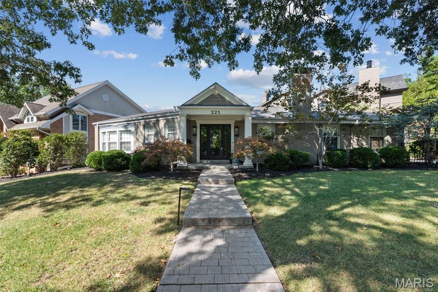 Est. 1952. Welcome to this gorgeous, well-appointed brick ranch, perfectly set on a prominent corner lot in one of Clayton’s most desirable neighborhoods. Completely renovated with thoughtful updates inside and out, this 3 bedroom, 3 full bath home combines classic architecture with modern luxury, offering the best of both worlds. From the stamped concrete walkway and charming front porch to the sleek, contemporary backyard, every element of this property has been designed with care and quality in mind. Step inside and be greeted by the warmth of oak hardwood floors that flow seamlessly throughout the main level. Every detail has been elevated—from the thick, high-end solid wood interior doors with stylish chrome lever handles to the oversized double-hung windows that flood each room with natural light. The curved entry foyer makes a graceful first impression and leads you into the elegant living room, where a tray ceiling and gas fireplace create an inviting gathering space. The main level also features a versatile home office with vaulted ceiling, ideal for remote work or study, complete with direct access to a stamped concrete patio. The formal dining room, accented with a decorative wall insert, provides a beautiful backdrop for entertaining and flows directly into the chef’s kitchen. This space is a true standout with marble countertops, Wolf 5-burner gas cooktop, Wolf double ovens, Grohe faucet, double sink, abundant cabinetry, generous pantry space, and even hidden washer/dryer hookups built seamlessly into the cabinetry. The primary suite is nothing short of luxurious. A tray ceiling and curved bay window add architectural charm, while the custom walk-in closet offers thoughtful organization. The spa-like bath includes a stand alone jetted tub, dual vanities with Grohe faucets, marble countertop, heated tile flooring, and a stunning corner shower with marble surround and basketweave tile floor. Two additional bedrooms and another beautifully updated full bath complete the main level. The partially finished lower level expands the living space with a cozy family room featuring a cedar closet, plus a flexible sleeping or exercise area, additional full bath, laundry, and ample storage. Whether you need extra space for guests, hobbies, or workouts, this level adapts to your needs. Outdoor living is equally impressive. The kitchen opens to a contemporary Ipe wood deck with sleek cable railings, overlooking a private, fully fenced backyard designed for both relaxation and entertaining. Professional landscaping and exterior lighting in the front and back enhance curb appeal and create an inviting ambiance after dark. An oversized 2-car tuck-under garage provides convenience and additional storage. Recent updates include new HVAC (2020), new roof (2022), and new insulated garage door (2023), ensuring peace of mind for years to come. The location is unbeatable—just steps from Shaw Park and minutes from downtown Clayton, offering award-winning Clayton School District, top-rated restaurants and vibrant community amenities. This home is the perfect blend of elegant design, high-end finishes, and functional spaces inside and out. Move-in ready and beautifully updated, it’s an exceptional opportunity to enjoy luxury living in the heart of Clayton.