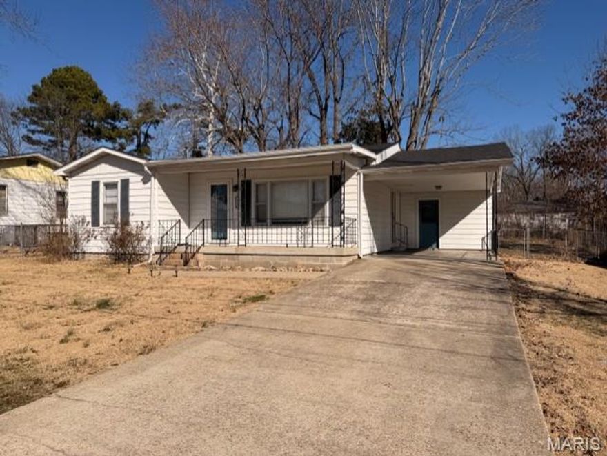 Welcome to this charming 3-bedroom, 1 bath beauty featuring 1,184 +/- sq ft of thoughtfully designed space. The spacious kitchen is light filled with ample storage. The oversized third bedroom offers flexibility- create a playroom, office, media room or even a dreamy primary suite! Real wood flooring throughout makes this warm and add character throughout the home! Step into the sunroom and enjoy views of the fenced backyard-perfect for morning coffee or watching the kids play! With covered parking and a fantastic location and desirable side of town, this home is ideal for families! This could also be a wonderful investment property to add to your portfolio! You want to see this one.