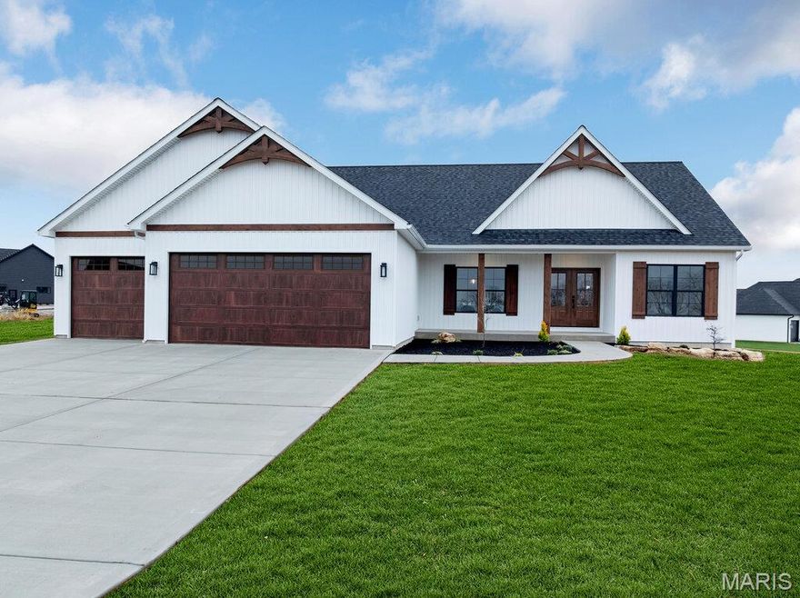 New Construction — Modern Comfort with Lakeside Views in a Private Gated Community! Welcome to this beautifully designed new construction home, where modern style and quality craftsmanship come together in a peaceful secure gated community. Set on 1.54+/- acres and offering tranquil lake views from the backyard, this 1,950 sq. ft. residence provides an ideal and well- designed blend of comfort, space, and privacy. Inside, the open-concept layout features vaulted ceilings and large-plank luxury vinyl flooring throughout the main living areas. The great room, dining area, and kitchen flow seamlessly, creating a bright and inviting atmosphere perfect for both everyday living and entertaining. The kitchen offers custom cabinetry, generous counter space, and tasteful finishes that elevate the home’s modern character. Large windows bring in abundant natural light while capturing views of the surrounding landscape and the serene lake. A split-bedroom design provides a sense of separation and privacy. The primary suite includes a spacious walk-in closet and an elegant en-suite bath with double sinks and stylish details. Two additional bedrooms are comfortably sized and share a well-appointed full bath. The 9-foot pour basement offers exceptional potential for future expansion—envision a recreation room to entertain family & guests, maybe a home gym, home office or just some additional living space — a blank canvas to make your own. Outdoor living is equally appealing, with a covered front porch and a rear patio that make it easy to enjoy the quiet natural setting. The oversized three-car garage provides ample room for vehicles, storage, and recreational equipment. This home provides an inviting atmosphere and tranquil setting — the perfect retreat — and still conveniently located near shopping, dining, and major commuter routes. With its modern design, thoughtful layout, and scenic backdrop, this property is a standout opportunity for anyone seeking peaceful, contemporary living. Schedule your private showing today and experience everything this home has to offer. Agent owned.