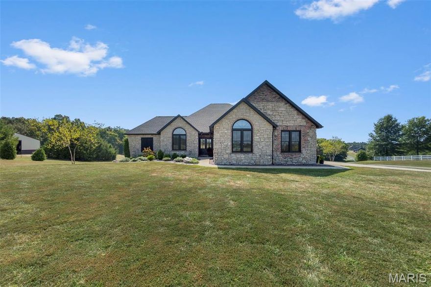 Want a hidden secret that seems far away but is actually really close? This beautifully built custom all-brick and stone home in the peaceful setting of Saddlebrooke Ridge just might be the one! Sitting on approximately 3 acres with no neighbors in front or back. Step inside to an open split-bedroom floor plan with nearly 5,200 sq. ft. of finished living space. The heart of the home features custom Liley granite countertops, tile backsplash, and stainless steel appliances that stay. You’ll love the spaciousness with 4 bedrooms, 3 full baths, a large bonus room in the basement, and a John Deere room. Updates abound, including a newly installed roof and a new saltwater pool—perfect for summer entertaining. Saddlebrooke Ridge offers the best of community living with private lakes, great for walking, and fiberoptic internet—a true one-of-a-kind development. A wonderful opportunity to own a home in a prestigious area tucked just outside of town but only 5 minutes from uptown Jackson!