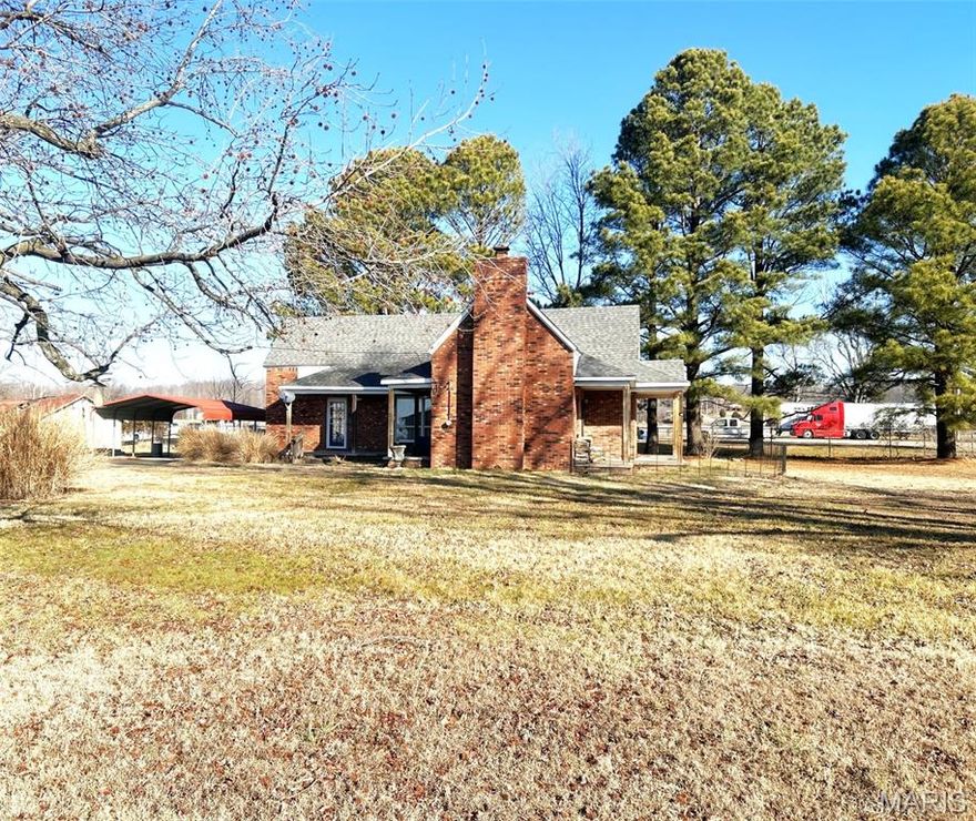 Are you searching for a home w/character & affordable, but also move-in ready? This home has had several updates& is ready for new owners. Currently, there are 2 bedrooms, a living room & family room, but you could convert family room into a 3rd bedroom, if you choose. It has an eat-in kitchen, new 2019; dishwasher, new 2019; water heater, new 2020; and roof less than 10 years old. An "old-style" pass-through is located between the kitchen & living room. Small office is near the main bedroom. Ample storage & 2 sinks in bathroom. Clean & well-maintained, brick w/2, relaxing front porches.  Wood-burning fireplace in family room, but home also had new central heat & air system replaced in 2019. This home sits in the heart of town but has large shade trees. One can sit & relax outside and feel as though they are on the outskirts!  Ample parking on the large concrete drive or under the 2-car carport.