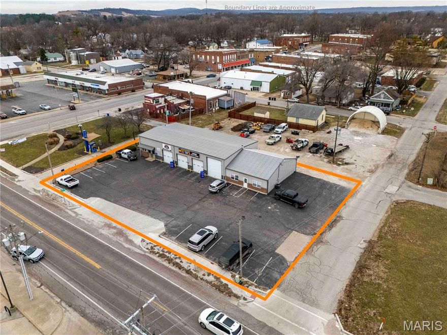 Discover an exceptional investment opportunity at 107 North Main Street, where a fully equipped, 4,400+/- square foot mechanic shop awaits your vision. This turnkey operation not only includes all equipment but also provides a well-structured layout tailored for various automotive services.

Fully Equipped: All shop equipment is included in the sale, ensuring a seamless transition to the new owner. Mechanics’ personal tools are excluded.

Impressive Facilities: The shop features three spacious bays, each equipped with car lifts, and ample space to accommodate semi or dump trucks.

Specialized Areas: Benefit from a dedicated tire machine and balancing bay, alongside flex space ideal for a detail shop.

Office and Reception Space: Two offices, three bathrooms, and a welcoming reception area enhance the operational capability.

As the largest mechanic shop in town, this property offers multiple income-generating opportunities suitable for an owner/operator or as an addition to your real estate portfolio. Enjoy city water and sewer services, making it a practical and attractive investment.