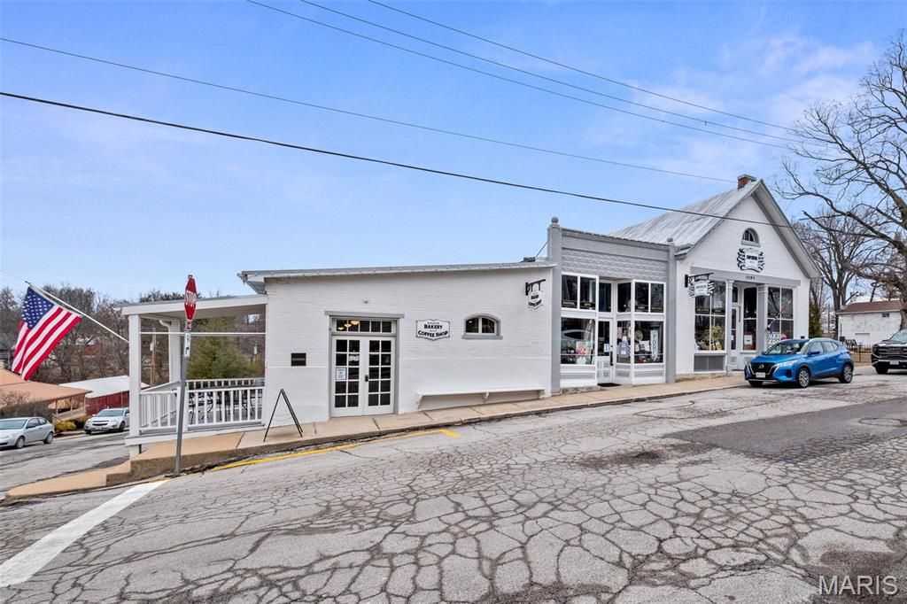 Photo of 5595 Walnut and .21 Acre lot on Jackson Street, Augusta, MO 63332 (MLS # 26007832)