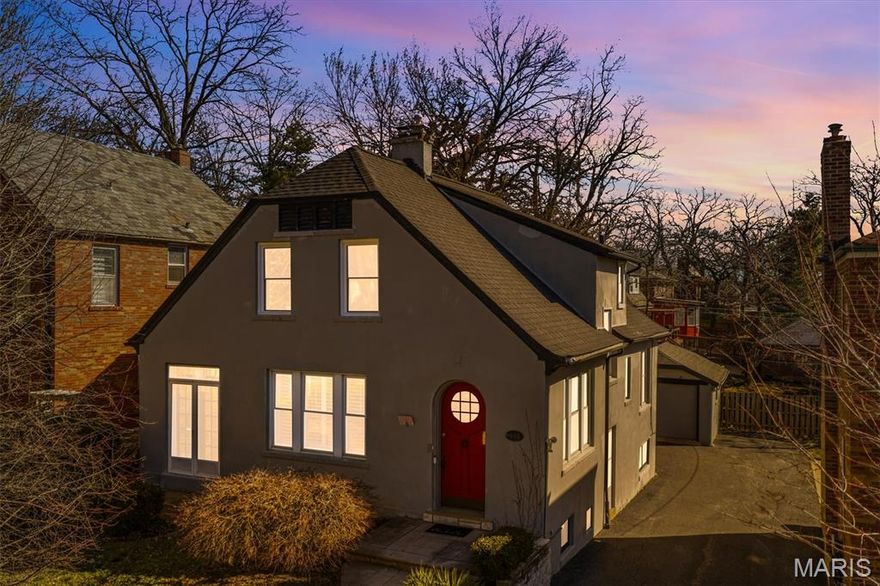 Welcome to this enchanting two-story cottage-style home with 3 spacious bedrooms and 2 bathrooms, and lots of charming details throughout. Step through the cozy arched front door to rich wood flooring, complemented by an abundance of natural light pouring in through generous windows. A cozy brick fireplace serves as a stunning focal point in the living area—perfect for relaxing evenings or gathering with friends and family. The open kitchen is thoughtfully designed with ample cabinetry for storage and sleek stainless steel appliances. Upstairs, you’ll find more delightful cottage-inspired details, including painted wood paneling and a sloped ceiling that adds a storybook quality to the third bedroom. The unfinished basement holds excellent potential for future expansion, a home gym, or abundant storage—ready to be customized to suit your needs. Outside, a detached garage provides added convenience and flexibility for parking or even a workshop space. Located just a few blocks from Clayton, beautiful parks, and top-rated restaurants and shopping.