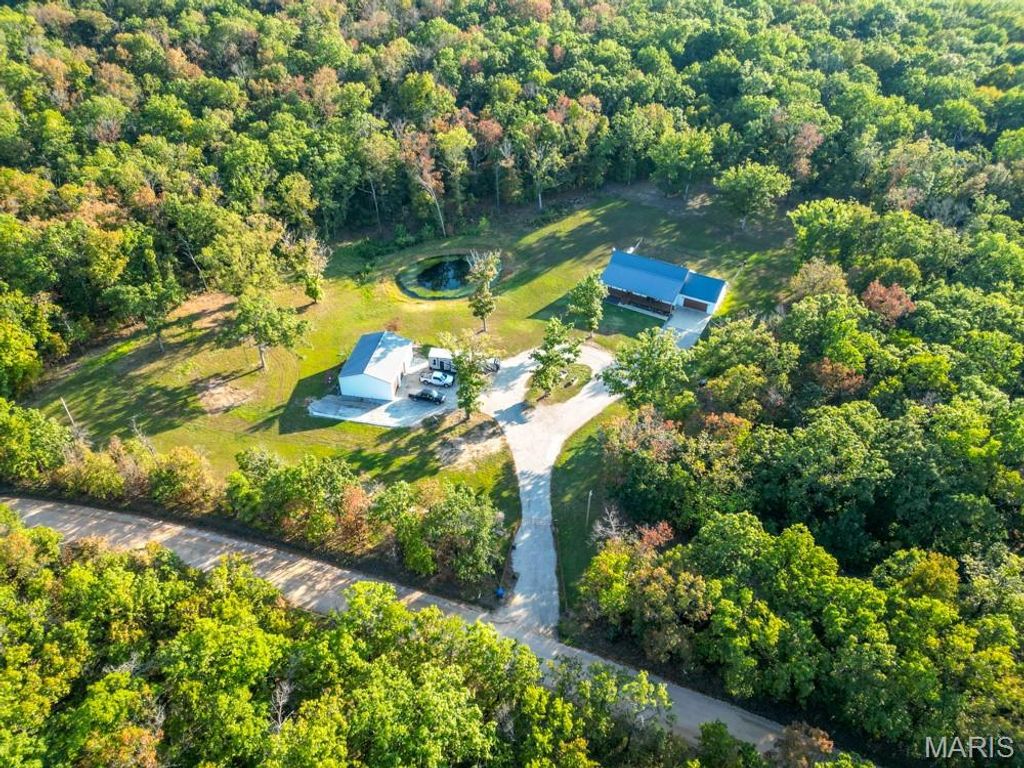 Photo of 13940 Industry Road, Lebanon, MO 65536 (MLS # 25073168)