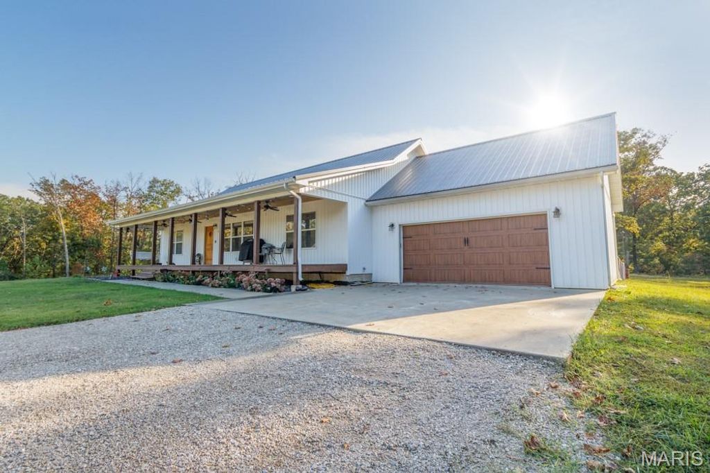 Photo of 13940 Industry Road, Lebanon, MO 65536 (MLS # 25073168)