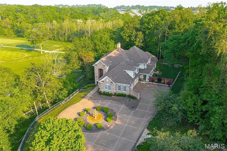 Rare opportunity to own a private, luxury home w/ stunning views of Sunset Hills Golf Course from every level. As you enter the grand foyer, you'll be greeted by a formal great room featuring a two-story fireplace. This home offers over 7,000 sq. ft of living space, including 4 beds & 5.5 baths. The main floor boasts a primary suite, spa bath & walk-in closet. Gourmet kitchen w/ premier appliances, center island &  breakfast bar open to family room. Breakfast area includes custom built-ins w/ workstations & leads to covered deck overlooking a private oasis. Main floor also includes mudroom, laundry room & oversized 3 car garage with EV charging station. Upper level offers spacious loft for additional seating, 3 bedrooms & impressive home theater for endless movie nights. The finished walk-out LL is an entertainer's dream:  recreation room, family room, wet bar, playhouse, 1/2 bath, & a unique and secure wine cellar/tasting room! There is also room to expand in the LL! Heaven in 63127! Additional Rooms: Mud Room, Wine Cellar