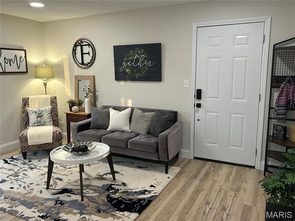 Photo of 115 Lemans Court #115, Lake Saint Louis, MO 63367 (MLS # 26019726)