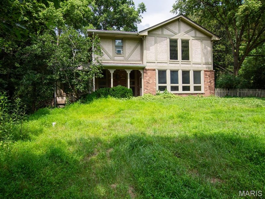 Imagine owning your private retreat in the heart of St. Louis County but feeling like you are miles from anywhere! Imagine a short drive home to your secluded 28 +/- acres where you get to be the king or queen of your castle. 789 St. Paul Road offers you the freedom to create your own paradise as you see fit! Located in Wildwood, in the Rockwood School District and less than 10 minutes from the restaurants and shops in Ellisville, you’ll enjoy the perfect blend of city and country living. Potential reigns supreme here, with the possibility of horses, a pool, or even a brand-new home. A custom built 4 bedroom, 4 bathroom home with a main floor primary suite, 2 story great room with a fireplace, main floor laundry, and 3 car-attached garage could be renovated to suit your needs or replaced. The property also features a barn and cleared land for horses or starting a mini-farm. A newer septic system is present on the property. The property will be conveyed in it’s current, AS-IS, condition.