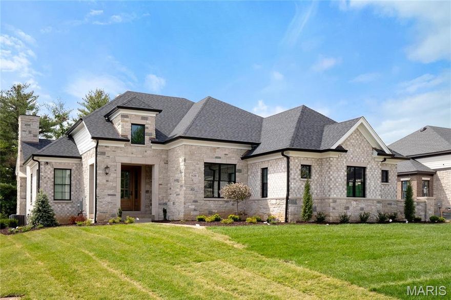 Move-In Ready! The popular Newport Inventory/Display by Simon Homes is located in prestigious Frontenac (in Ladue school district) offers a perfect blend of outstanding features nestled in a desirable neighborhood conveniently located just minutes from shopping, dining, parks, and schools. The entry foyer leads to an open floor plan including a study, great room with a fireplace, tray ceilings and wood beams.  The kitchen is a chef’s dream open to a large eat in  dining room leading to a covered three season room with a stone fireplace.  The main floor of nearly 2,900 square feet also includes a luxurious Master bedroom suite, second bedroom with full bath, laundry room, powder room,  and a convenient family foyer with a private outdoor entrance adjoining the 3- car side entry garage.  The lower level includes 1,709 square feet of finished space including a third bedroom, full bath, and an amazing walk- behind wet bar with a built-in wine display and more! GPS: USE 11411 N 40 Dr 63131.