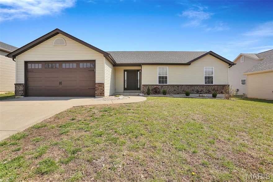 This inviting 3 bedroom, two-bath ranch home features an open and functional layout perfect for everyday living. The kitchen offers a convenient pantry, abundance of cabinetry, center island that allows seating, and flows seamlessly into the dining area. Just off the dining space, step out onto the patio and enjoy views of the beautiful fenced backyard, ideal for relaxing or entertaining. A spacious living room showcases vaulted ceilings and warm wood flooring, enhancing the home's open and airy feel. The main floor laundry adds convenience to your daily routine. Large primary bedroom includes a private full bath with tub/shower combination, while two additional bedrooms and a second full bath provide comfortable accommodations for family or quests. A full unfinished basement with an egress window offers excellent potential for future living space or ample storage. Two-car oversized garage. With great curb appeal and a desirable layout, this home is ready to welcome its next owner. Newer updates in the last 2 years include roof, siding, gutters, downspouts, garage doors, some light fixtures, landscaping etc...Easy to show, make your appointment today. Agent/buyer Please verify School District.