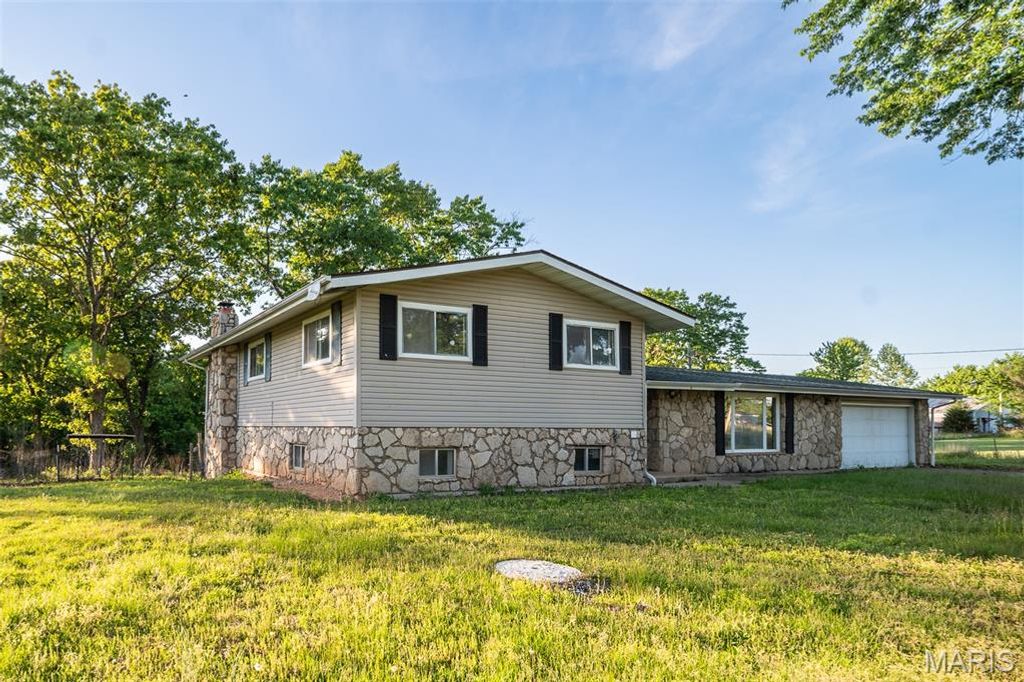 Photo of 22985 Reporter Road, Waynesville, MO 65583 (MLS # 26027691)