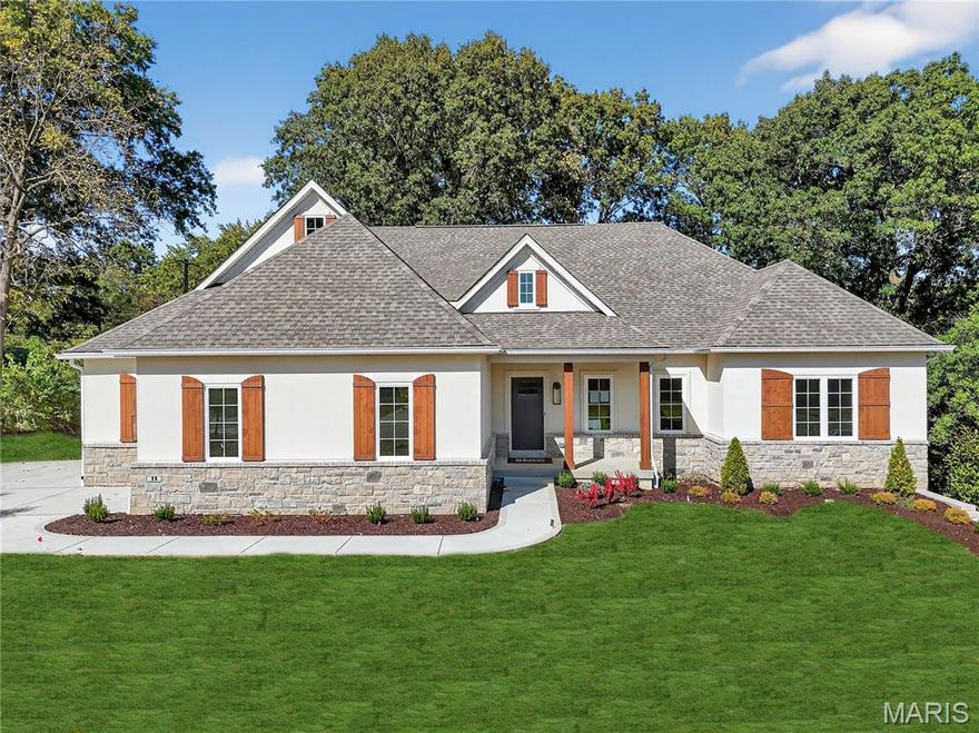 MOVE IN READY NOW! This stunning Lasalle home boasts 3,926 sq. ft. of thoughtfully designed living space, featuring a side-entry 3-car garage. The luxurious primary suite offers a spa-like retreat with dual vanities, an oversized walk-in closet, and a beautifully designed bath. The great room is an entertainer’s dream, with soaring 11-foot ceilings, floor-to-ceiling windows, and a gas fireplace wrapped in custom built-in bookshelves. The gourmet kitchen has been expanded for additional space and showcases a large island, perfect for gatherings. Enjoy the outdoors year-round on the spacious 20x13 covered deck. The finished lower level provides even more living space, complete with a recreation area, additional bedroom, and full bathroom. With impeccable craftsmanship and luxurious finishes, this home is designed for both comfort and elegance.