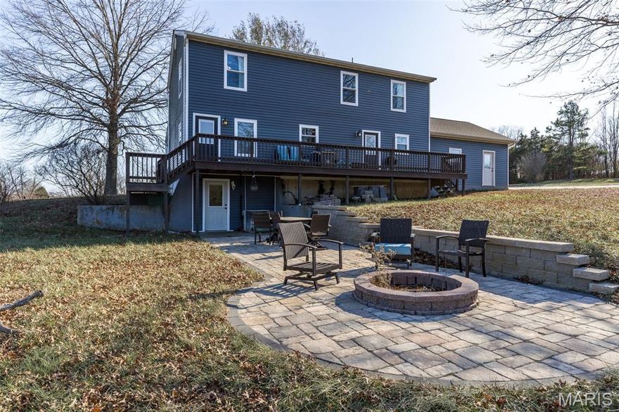 Discover Your Private Retreat at 2161 Young Rd, Pacific, MO 63069! Tucked away in the scenic Riverbend Estates neighborhood, this traditional two-story farmhouse offers a unique combination of open space, classic charm, and modern comforts — all just minutes from Pacific and Hwy 44. Set on approximately 8.7 acres of usable land (2 parcels), the property is a rare find for anyone seeking tranquility, room to grow, and a lifestyle close to nature.
As you approach, the wide 40-foot front porch greets you with a timeless invitation to sit, relax, and take in the view. Whether you're sipping coffee in the morning or winding down at dusk, this space sets the tone for what life here feels like — peaceful, open, and connected to the land. Step inside and you'll find nearly 3,000 square feet of living space thoughtfully laid out across two levels. The home features a traditional floor plan, complete with a welcoming foyer, a formal dining room, and a comfortable living area that allows for both everyday living and entertaining. The kitchen is equipped with granite countertops, offering both durability and style, while the main-level layout encourages flow and functionality. The home includes four generously sized bedrooms and four bathrooms — two full and two half (one of the half baths can be finished to be full!)— providing flexible accommodations for families, guests, or home office needs. Recent upgrades include new windows installed in 2024, adding energy efficiency and letting in beautiful natural light throughout. Downstairs, a full walk-out basement offers even more potential, whether you envision a home gym, game room, guest suite, or extra storage. With direct access to the backyard, this area is as functional as it is expansive. 
The outdoor features truly make this home stand out. Beyond the new back patio perfect for barbecues or evening gatherings, you’ll discover a special retreat: a pavilion overlooking a beautiful, stocked pond. Complete with a brick fireplace and picnic tables, this serene lakeside setting invites everything from family reunions to quiet afternoons by the water. The surrounding open land creates endless possibilities — from gardening and play spaces to hosting events or enjoying your own piece of the Missouri countryside. Chicken coop included at no charge! This is country living! 
Nature lovers will appreciate the backdrop of the Shaw Nature Reserve, which borders the property and enhances the sense of privacy, while providing immediate access to hiking trails, native wildlife, and changing seasonal scenery.
Located just minutes from the amenities of Pacific, this home offers easy access to schools, shopping, and major highways — a true blend of rural quiet and urban convenience. The Meramec Valley R-III School District serves the area, making it a great location for families seeking space and schooling options.
Whether you're envisioning a forever home, a weekend escape, or a property that offers flexibility and freedom, 2161 Young Rd delivers charm, comfort, and natural beauty in equal measure. Horses are also allowed!