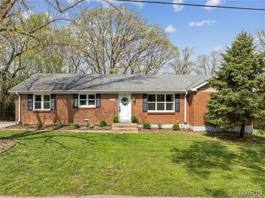 Spacious all brick ranch home in High Ridge offers serene surroundings, yet convenient location, close to amenities. The bright living room is inviting with coved ceilings along with new luxury vinyl plank flooring. A separate dining room accommodates gatherings intimate or grand. The kitchen has stainless appliances, including built-in microwave, & gets an abundance of natural light. The attached breakfast room opens to a multi-level deck overlooking expansive yard with wooded & wildlife views. There's even a storage shed for your yard & garden gear, because you'll be tempted to start a mini farm with all the space on the 1.69 acre lot. Back inside, four bedrooms on main level have newer vinyl plank flooring (2025). PRIMARY SUITE has attached full bath & walk-in closet. Another full bath completes the main level. A unique PRIVATE ENTRY STUDIO APARTMENT in the lower level walk-out offers flexibility and income potential. With a large 13x20 living room, eat-in kitchen with booth, and a full-bath, it's ideal for a student, rental, or guest suite. The remaining basement is currently not accessible from the apartment (a door could easily be installed to reconnect) and has ample storage space, laundry, and potential for workshop or hobbies. Shopping, dining, highways nearby. Well-maintained and move-in ready.