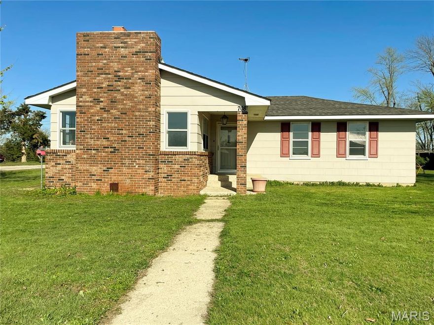 Roomy ranch home on a huge corner lot in Edgar Springs.  3 bedrooms, fireplace in living room, huge dining room, big utility room.  A lot of house on 1-level!