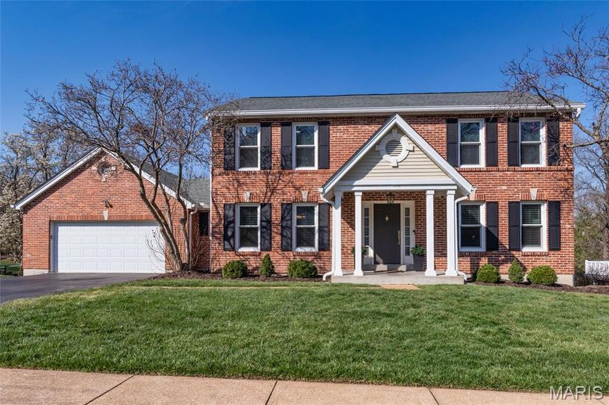 Located in desirable Chesterfield with quick Highway 40 access, this fully remodeled 2-story blends modern design, everyday function, and upscale finishes tailored for today’s lifestyle. The neighborhood elevates it even further with resort-style amenities including a community pool overlooking a scenic lake and tennis courts—perfect for active living and relaxed weekends close to home.

Inside, fall in love with the exceptional hardwood flooring flowing throughout the entire main level, setting a warm yet sophisticated tone. The family room is both inviting and stylish with a statement fireplace, elegant bay windows, and plantation shutters, seamlessly connecting to the breakfast room and a trendy built-in bar serving area that’s ideal for hosting friends or unwinding after a long day. The breakfast room opens to a truly standout kitchen designed for those who appreciate craftsmanship and quality. Kitchen features high-end custom cabinetry with extensive built-ins, Taj Mahal Quartzite countertops, designer hardware, premium appliances, a dramatic custom range hood, and a spacious center island that anchors the space for cooking, gathering, and conversation. A formal dining room is ready for hosting dinner parties, while a flexible front room serves perfectly as a home office or reading area. Don't forget about a convenient main floor laundry room and stylish half bath—thoughtfully placed for daily ease and guest use.

The rear of the home delivers a true wow moment, perched above expansive green space and offering peaceful views from both the screened-in porch and deck—an ideal setting for morning coffee, evening wine, or quiet outdoor relaxation.

Upstairs, the primary suite feels like a private retreat with vaulted ceilings, brand new carpet (2026), and a beautifully remodeled spa-inspired bath featuring a large walk-in shower, separate soaking tub, dual vanities, and tile flooring. Three additional bedrooms with new carpet (2026), a versatile loft perfect for work, gaming, or study space, and a refreshed hall bath complete the upper level.

The walkout lower level provides excellent future potential for added living space, fitness area, or media room. Additional highlights include a newer roof (2023), replaced windows on main and upper levels plus lower level sliding door, oversized 2-car garage, irrigation system, spacious yard & much more!

Modern updates, flexible living spaces, and scenic surroundings make this home a rare opportunity that checks every box. Showings begin April 10th!