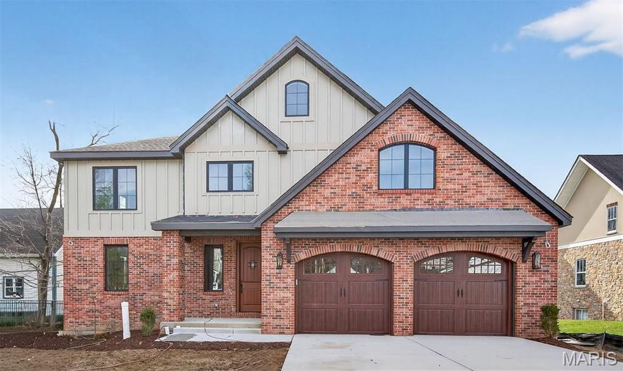 Home is complete and ready to move in!!! Welcome to the heart of Kirkwood — where timeless craftsmanship meets modern luxury. This custom-built five-bedroom, four-and-a-half-bath residence is nearly complete and ready for move-in, offering an extraordinary blend of sophistication, comfort, and design excellence.  From the moment you enter, you’ll be captivated by the thoughtful detail throughout — 9-foot foundation and first-floor ceilings, an architectural custom staircase, and an elevated trim and paint package showcasing crown, casing, and picture molding. A designer powder room with a custom wall treatment and a premium lighting package further enhance the home’s refined style.  The chef-inspired executive kitchen is a true centerpiece, featuring 42-inch custom cabinetry, quartz countertops, backsplash, and a Frigidaire Gallery appliance suite complete with a Sharp microwave drawer and decorative wood hood. The walk-in pantry includes a melamine organization system, while Delta, Elkay, and Kohler fixtures elevate every space. Open to the great room, the kitchen flows seamlessly into an inviting living area highlighted by a quartzite fireplace hearth and surround, creating an ideal environment for both entertaining and everyday living. Hardwood flooring graces the main level, staircase, and upper hallways, complemented by upgraded carpet and padding in all bedrooms.  The luxurious first-floor primary suite offers a private retreat with spa-inspired finishes, including a custom-tiled shower, dual vanities, and quartz countertops. Upstairs, additional bedrooms feature Jack-and-Jill baths with designer tilework and abundant natural light, providing comfort and style for family or guests alike.  The finished lower level expands your living space with LVP flooring, a custom bar area, bedroom, full bath, and a versatile bonus room  "optional"—perfect for an exercise studio, home theater, or a sophisticated wine or bourbon room.  Step outside to a spacious backyard offering endless possibilities, including an optional third-car garage bay and/or future pool opportunity.  Every element of this home has been meticulously curated to deliver an exceptional living experience—balancing elegance, craftsmanship, and modern functionality. Nestled in one of Kirkwood’s most desirable neighborhoods, this is more than a home—it’s a lifestyle defined by luxury, comfort, and timeless design.