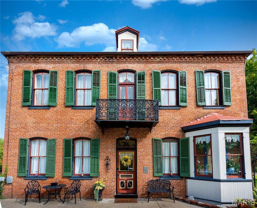 Historic charm meets turn key investment at the prestigious Wohlt House.  This 3 story mansion was built in 1883 as the family home for the first mayor of Hermann, August Wohlt, and is listed on the National Register of Historic Places.  After extensive renovations and improvements, the Wohlt House now operates as a profitable bed & breakfast.  This iconic establishment boasts spacious rooms, 10' ceilings, and spectacular woodwork throughout; as well as modern plumbing, electric and dual hvac.  There is a large 2-story detached garage on property with plenty of storage space. All furnishings and decor included with exception to some personal items.  Located in the heart of downtown Hermann, Wohlt House is a short walk from the train station, restaurants, shops, wineries, and other tourist attractions.  With an impressive 4.8* rating, it is no wonder that the 4 bedrooms/bathrooms are consistently occupied. Don't miss out on this rare opportunity to own a piece of history in Hermann Missouri!