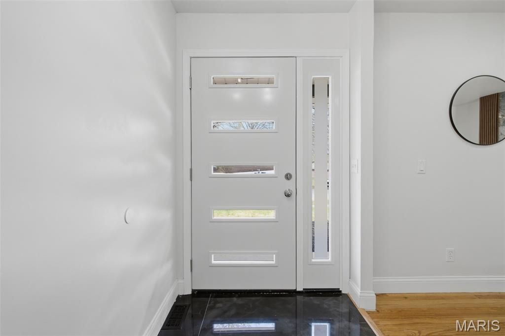 Photo of 11340 Wamsutta Trail, Florissant, MO 63033 (MLS # 26021717)