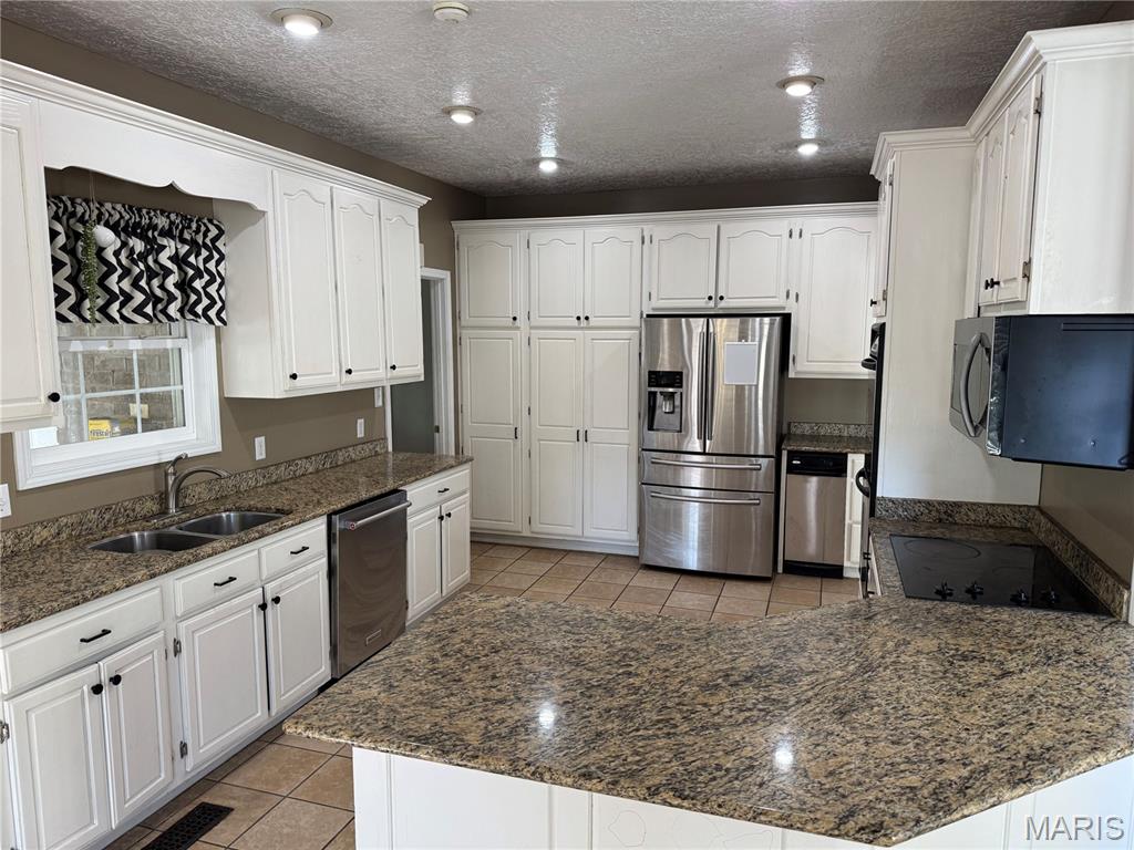 Photo of 431 Pine Street, Caruthersville, MO 63830 (MLS # 26067926)