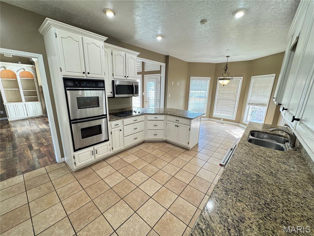 Photo of 431 Pine Street, Caruthersville, MO 63830 (MLS # 26067926)