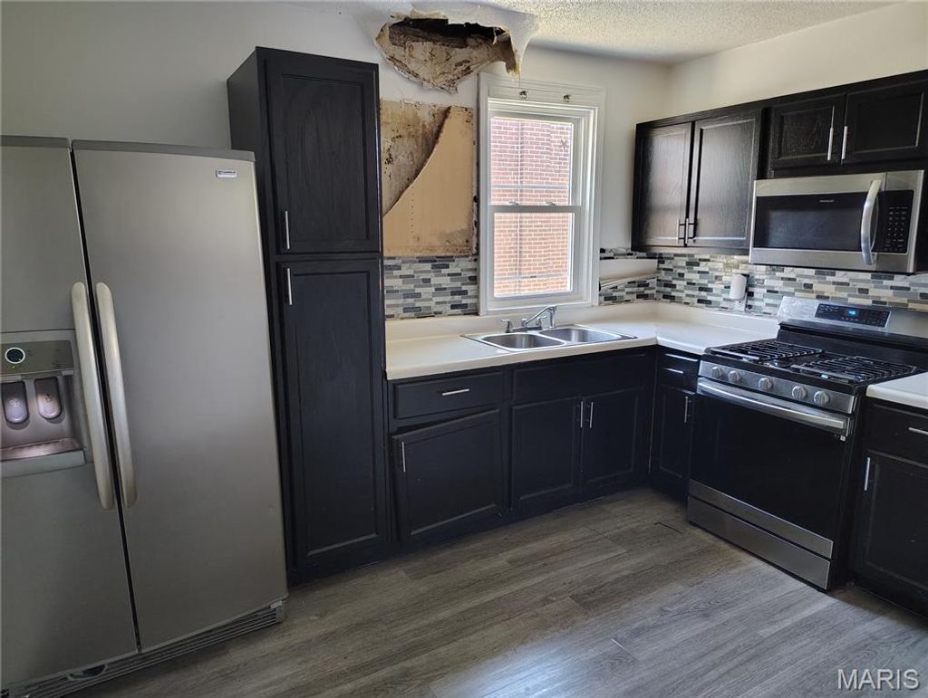 Photo of 5534 Beacon Avenue, St Louis, MO 63120 (MLS # 26028327)