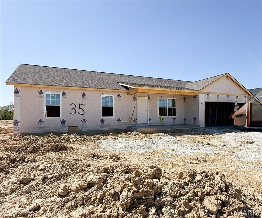 USDA No Money Down Territory! Just 7 Miles from Wentzville! Sales price is final price. Under Construction on level lot 35 of The Shire.  The Aspen Model Boasts 3Bed/2Bath Open Floor plan. Enter in to the Great Room with Vaulted Ceilings and a Ceiling Fan. In the Kitchen you will find Grey Shaker Cabinets, Granite counter tops with 60inch eat-in Island. The Kitchen sink overlooks the backyard. Stainless Steel Appliances and Recessed Lighting in the Kitchen. The Master Suite includes an oversized closet, ceiling fan, Plenty of natual lighting and on-suite bathroom with a Step-In Shower. Other Interior Upgrades include Upgraded Flooring, Tilt-in Windows, 2 Panel Doors with Black Hardware, Black finish Light Fixtures & Black Plumbing Fixtures. Full Basement W/ Egress Window, Sump-Pump, and Rough-In Bath. The Exterior includes 10x13 Covered Patio, Covered Front Porch, Architectural Shingles, Maintenance-Free Vinyl Siding with Shake Accent, and Fresh Sodded Front yard. Full sized 2 car garage with extra depth making it 24ft deep to fit those oversized pick ups. In the Garage you will also find a service door that leads to your covered patio. To be Completed at the beginning of June! Schedule your Appointment to walk through this home and see color selections.
