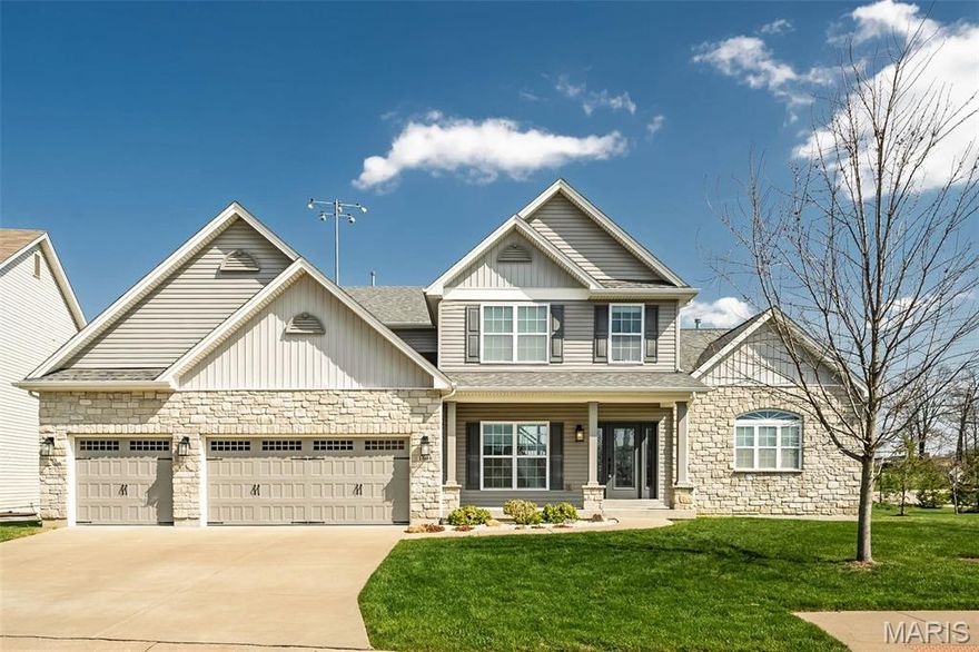 An impressive stone elevation highlights the remarkable curb appeal of this outstanding 1.5 Sty from McKelvey Homes. The popular floor plan features an open layout with wide plank wood flooring, neutral finishes and full-height windows that draw in an abundance of natural light. Wide covered porch entrance leads to gracious foyer that flows seamlessly into the formal dining room and spectacular great room with 11’ ceiling & dramatic wall of windows. Designer kitchen with staggered espresso cabinetry, Quartz countertops, stainless steel appliances, 7’ center island & convenient planning center adjoins light-filled breakfast room & hearth room accented by stone fireplace. Coffered primary bedroom suite with vaulted bath offers an appealing retreat. The 2nd floor extends the living quarters with 3 generous-sized additional bedrooms, 2 with Jack n’ Jill bath, hall full bath & step-up bonus room. Grounds include a fenced level backyard with patio & 3-car garage. Located in a highly desirable neighborhood with easy access to Lindbergh & Hwy 364. JC Community Recreation Center is just steps away. Showings start Fri. 4/10 and Open House Sun. 4/12 1-3pm