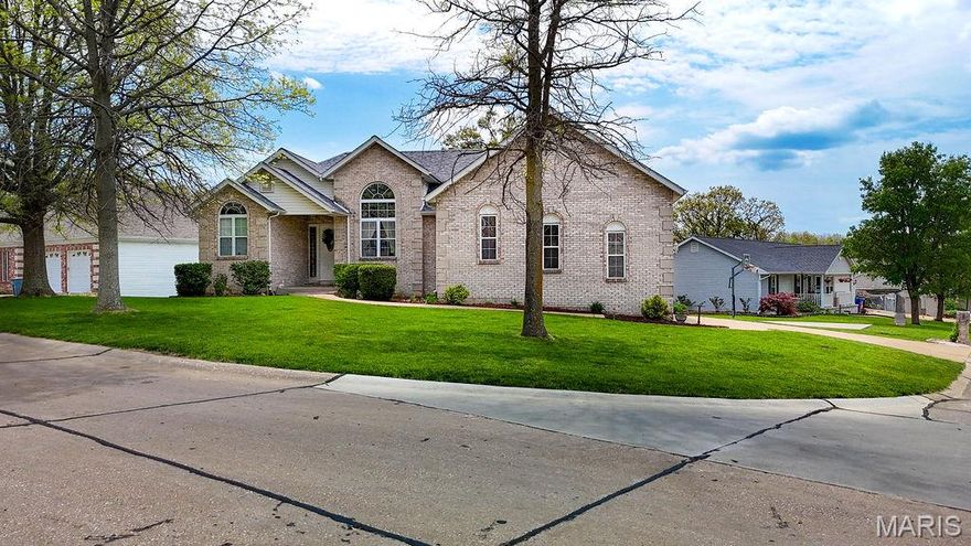 Spacious ranch home offering 5 bedroom, 4 full bathroom with a desirable divided floor plan and full finished basement. This property features three master - like suites each compete with attached full bathrooms and walk- in closets perfect  for multi- family generational living, an in - law suite or extended guest accommodations. Situated on a corner lot  in a beautiful subdivision, this home provides plenty of space both inside and out. Enjoy outdoor living with beautiful deck overlooking the yard with your  very own half basketball court- ideal for recreation and entertaining. With generous living space and a functional layout, this home is ready for a new family to move in and start making lasting memories.