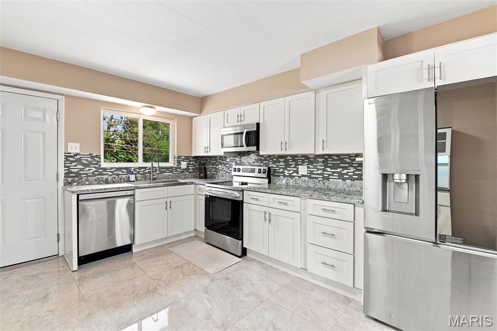 Photo 1 of 34 — 7929 Glenside Place, University City, MO 63130