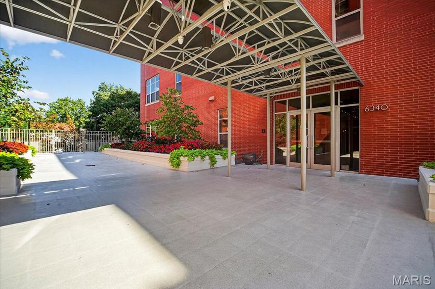 Sophisticated 2 bed, 2 bath condo offering nearly 2,000 sq. ft. of single-level living with 11’ ceilings and walls of 9’ north and east-facing windows. Stunning wide plank flooring flows throughout the open plan, anchored by a gourmet kitchen with stainless appliances. The spacious primary suite features a custom walk-in closet and spa-inspired bath with dual vanities, soaking tub, and separate shower. The second bedroom includes an office niche and a large walk-in closet with built-ins. Additional highlights include a generous utility room, two heated garage spaces, Clayton schools, and close proximity to Wash U, BJC, Forest Park, and major highways. Walkable to the neighborhood wine and cheese shop with Kaldi’s Coffee, Louie’s, and Sasha’s Wine Bar just a short stroll away.