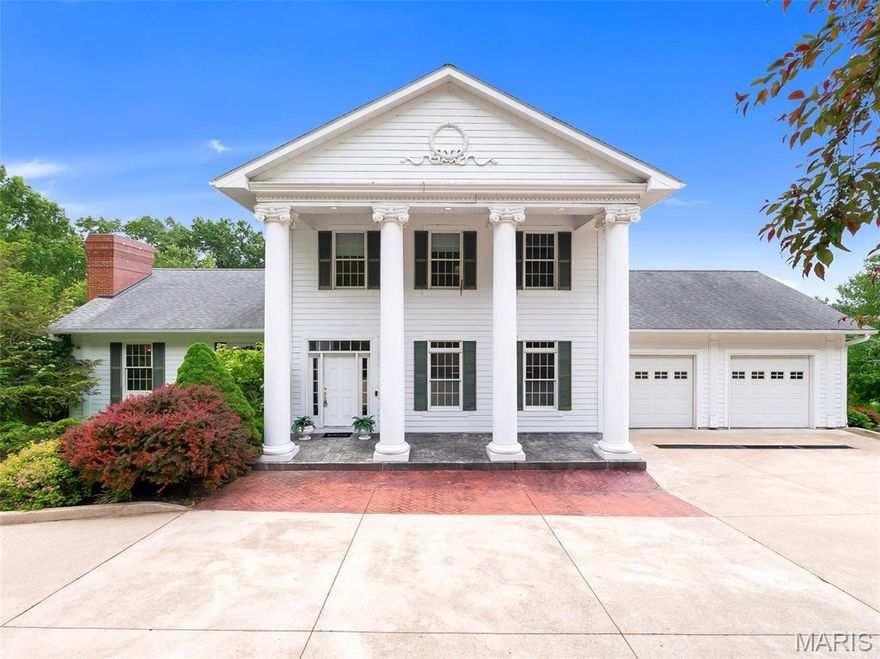 Situated on OVER 2+ acres and NEW ROOF on it's way! 5 bedrooms, 4 bathrooms, 3 fireplaces, 2 stories, 1 finished basement & the WOW factor at every turn! This beautiful Colonial Revival’s grand, estate-like presence offers unmatched views and total privacy. Picturesque columns line the covered porch, & gleaming wood floors pull you into the foyer where a sitting & living room await you. A family room leads to the eat-in kitchen with a breakfast nook & built-in curio; a dining room follows, and a full bath & laundry room complete the main floor. Upstairs, the massive primary suite has a unique bathroom with a laundry shoot, and a Juliette balcony to soak in the stunning vista. 2 bedrooms & a full bath with a lavish tub are down the hall. The remarkable LL hosts a family & rec room, office, 2 bedrooms– including another master with ensuite bath– eat-in kitchen & sunroom– a hospitable home of its own. Exquisitely maintained grounds with a 15-zone toro irrigation system and underground utilities with curbed/concrete streets surround the property, painting a storybook-like setting to admire. On Birch Creek Golf Club with a lighted concrete golf cart path that takes you right to the course & countless other amenities, you’ll want for nothing as you bask in the beauty of this perfectly-placed home– 2 minutes from interstate 44, and a 15-minute drive to the charming shopping and entertainment options in Washington. The location offers both the advantages of county living (close proximity to schools, emergency services, amenities) with the space and seclusion of a rural escape. Bonus: Exterior siding is James Hardie smooth plank fiber cement, and 580 Fairway Drive (1.28 acre neighboring property) & a 2026 individual weekday membership to the Birch Creek Golf Club are also included in the sale!
