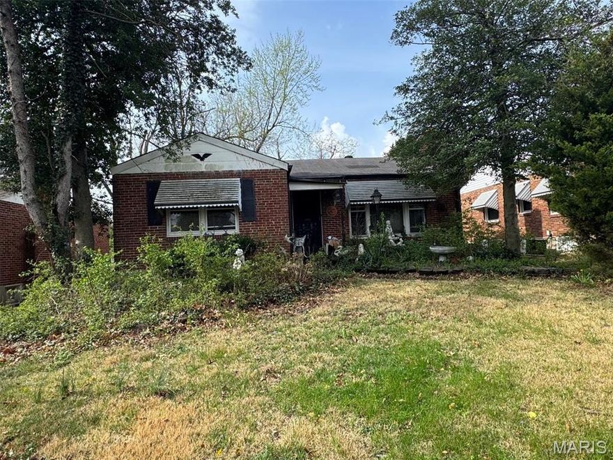 Calling all investors! This nice brick home needs someone to bring back to life.