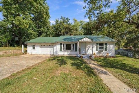 Photo of 710 West Street, Poplar Bluff, MO 63901 (MLS # 26060394)