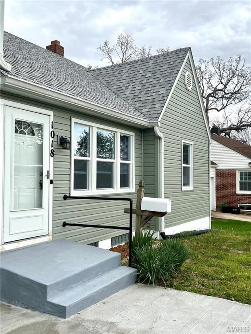 This home has had so many updates: a must see! Total all new Kitchen  with soft close cabinets , beautiful back splash , dishwasher, refrigerator and microwave. All new flooring thru out with vinyl plank. House has all new vinyl siding and windows. Roof is approximately 7 yrs. old. Furnace and central air under 11 years old. Main bathroom on main floor, 2nd bath is in basement in utility area. Washer and dryer stays. Large rec room  partially finished in basement. Large fenced in back yard.