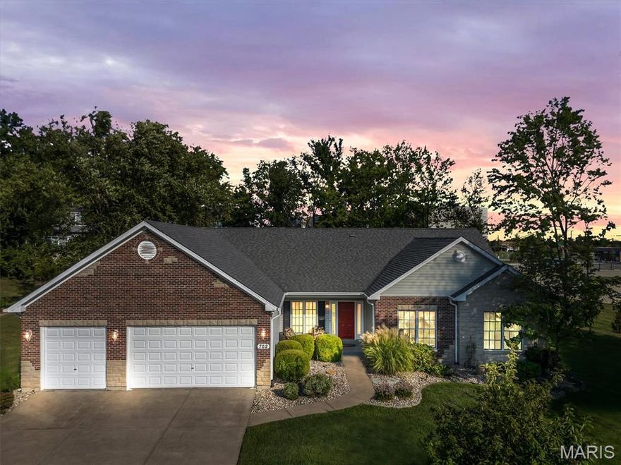 Elegance meets peace of mind in this meticulously maintained 3-bedroom, 3.5-bath ranch, tucked away on a quiet cul-de-sac. Designed for effortless living and entertaining, the open-concept floor plan showcases vaulted ceilings, rich hardwood floors, and sunlit spaces throughout. The impressive great room features a sophisticated double-sided gas fireplace with custom built-in bookshelves, creating a warm and inviting focal point shared with the breakfast room. The well-appointed kitchen offers both style and function with a center island, walk-in pantry, stainless steel appliances, and a breakfast bar—perfect for casual meals or gathering with guests. The adjoining breakfast room opens to a spacious 16x20 covered patio with ceiling fan, ideal for outdoor dining and relaxing evenings. Main-floor living includes a convenient same-level laundry room, a serene primary suite with a jetted tub and custom walk-in closet, and a spacious executive office framed by an elegant archway—easily convertible to a fourth bedroom if desired. The partially finished lower level expands your living space with a comfortable family room, recreation area, and full bath, plus abundant unfinished space for storage or future expansion. Major updates and infrastructure improvements (2017–2023) provide exceptional peace of mind, including: Whole-home Generac generator & LeafGuard gutters (2023), New HVAC system, roof, and skylight (2017–2019), Battery-backup sump pump (2021), surge suppressor, three French drains, and a 3-car garage. Outside, enjoy a professionally graded yard with an in-ground sprinkler system and four newly planted Arbor Vitae trees offering a lush, private backdrop. Ideally located near premier shopping, dining, and major highways, this rock-solid home delivers comfort, quality, and future potential in an exceptional setting.