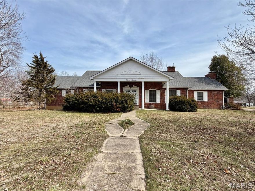 Full brick construction highlights the charm, character, and quality craftsmanship of a time when homes were built to last. This distinguished residence sits on a level 1.052-acre lot with a chain-link fenced backyard and root cellar. Offering 3 bedrooms, 3 bathrooms, and 2,592 sq ft, the layout includes an entry foyer, living room, family room with wood-burning fireplace, formal dining room, and a spacious kitchen featuring two sinks, refrigerator, oven, freezer, microwave and dishwasher. The primary suite offers a large walk-in closet and private ensuite with double sinks and walk-in shower. A huge attic provides expansion potential or abundant storage, plus a full walkout basement with bathroom and room to finish additional living space. Enjoy the screened-in sun porch for relaxing mornings or entertaining. Detached one-car garage, HVAC with heat pump (2023), roof approx. 10 years old. With thoughtful updates, this exceptional property offers the opportunity to create a truly stunning home tailored to your vision. Schedule a private showing today!