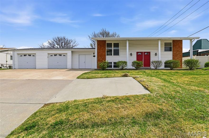 Welcome! This four bed, two bath, split level awaits new owners! Two car garage that boasts separate workshop or hobby area, plus oversized driveway. Freshly painted, some original hardwood flooring and new carpet! Tons of space in this home: living room, family room, dining room, and eat-in kitchen with vinyl plank flooring. Walk out basement, deck, patio perfect for entertaining. Large, fenced in back yard!