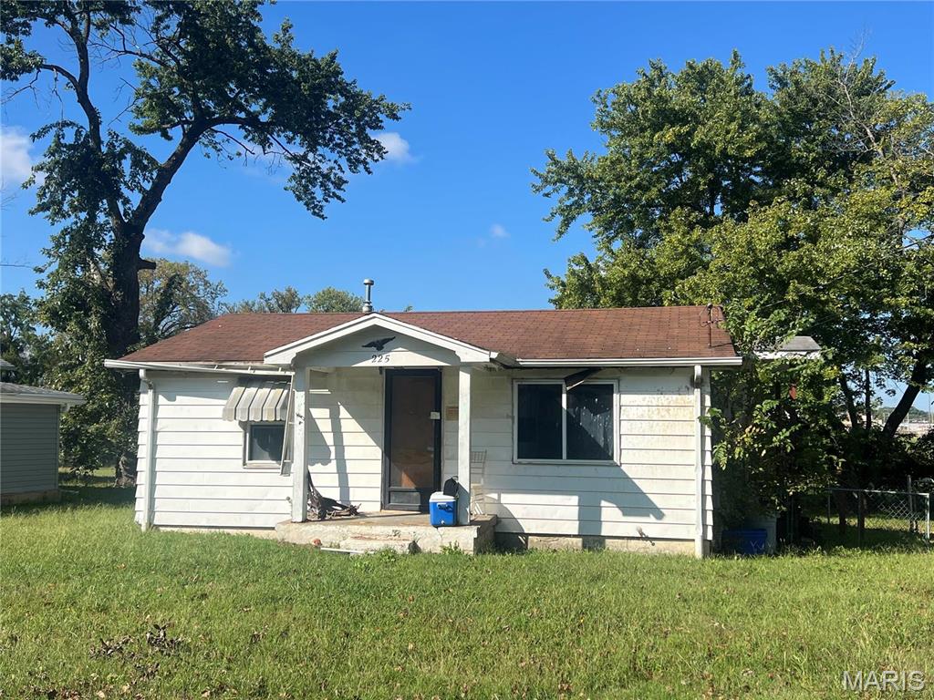 View of front of home with a front lawn